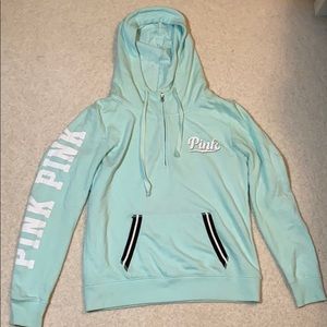 light blue/green sweatshirt